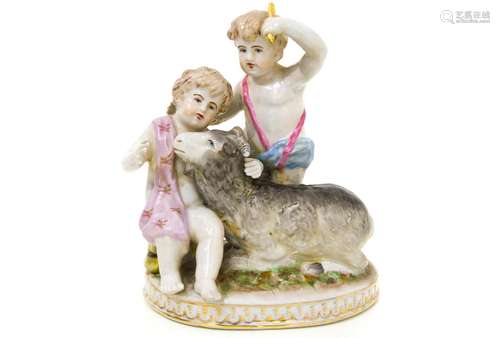 Porcelain statuette, begin of XX Century, Germany. Two children with goat. H cm 16x13x9