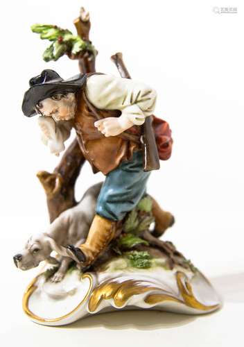 Capodimonte porcelain statuette. 20th century. Dog with hunter. H Cm 15. Minor pieces missing.