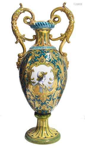 Ceramic vase, decorated with two medallions and golden accents. Green bottom. Early 20th century.