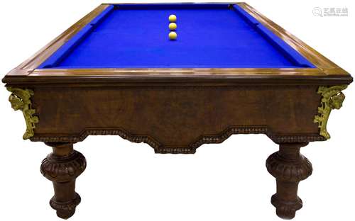 Pool table with six holes and elegant bronze decorations in the corner. With cues holder.