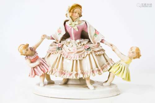 Karl Ens porcelain, Germany, early 20th century. Woman with little girls. Chips and breaks, H cm