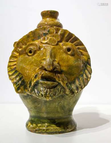 Majolica vase, with anthropomorphic sculpture. Southern Sicily. 20th century. 24cm. Chipped