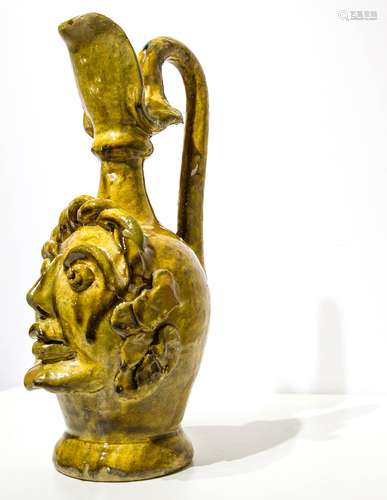 Majolica vase, with anthropomorphic sculpture. Southern Italy, 20th century. H cm 37. Chipped