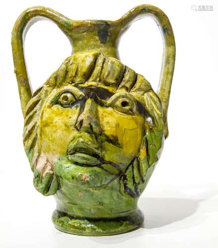 Majolica vase, with anthropomorphic sculpture. Southern Sicily. 20th century. 24cm. Chipped