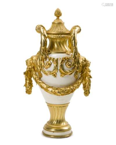 A gilt bronze-mounted white marble urn
