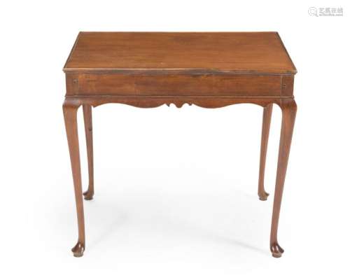 An English Queen Anne-style footed side table
