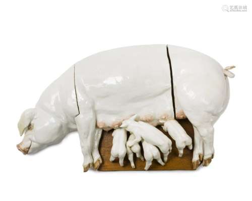 A Continental glazed ceramic sow and five piglets