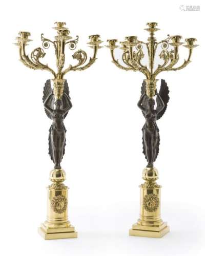A pair of Empire-style candelabra