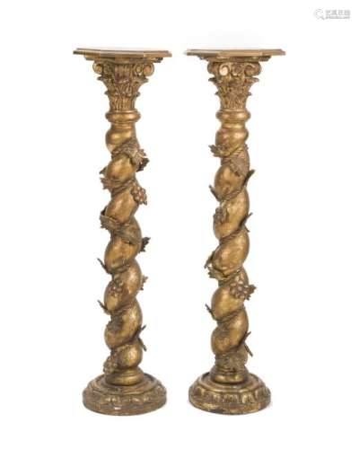 A pair of Italian twisted carved giltwood pedestals