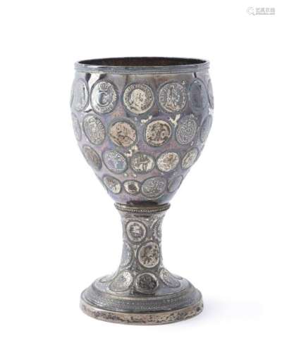 A silver coin-set chalice