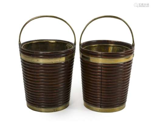 A pair of Irish Regency mahogany and brass peat buckets