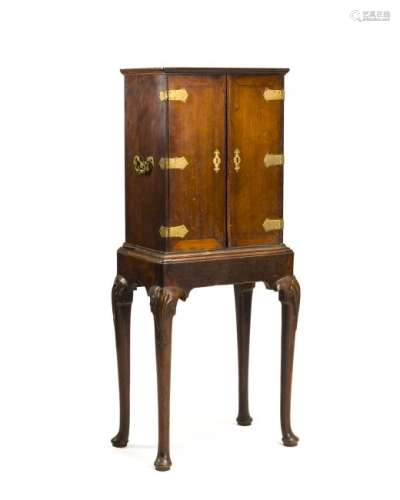An English mahogany cabinet on stand