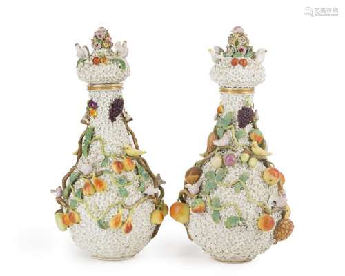 A pair of Meissen lidded urns