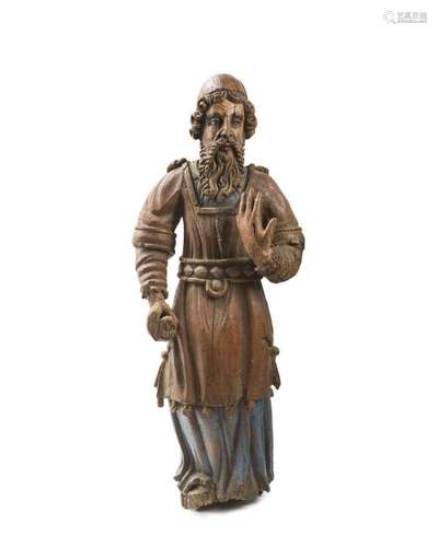 A carved wood biblical figure