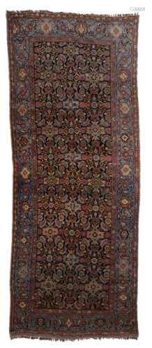 A wide Persian runner carpet