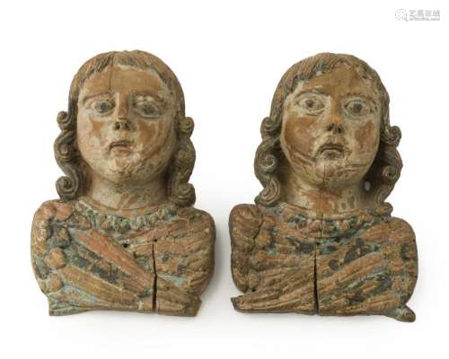 A pair carved wood angel busts