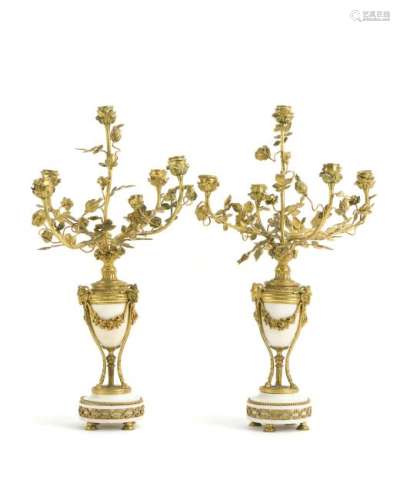A pair of Louis XVI-style candelabra