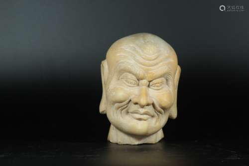 A Chinese Carved White Marble Buddha Head