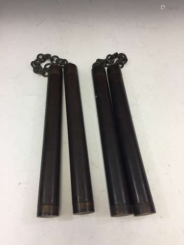 Pair of rose wood nunchucks.