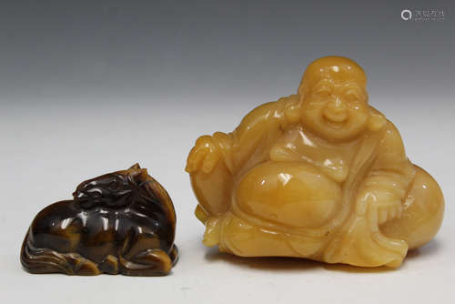 Chinese yellow stone and tiger's eye stone carvings.