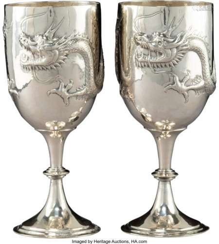 A Pair of Asian Hammered Silver Dragon Goblets,