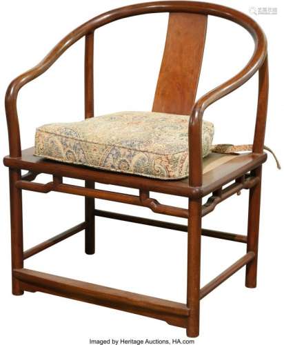 A Chinese Hardwood Horseshoe Armchair with Caned