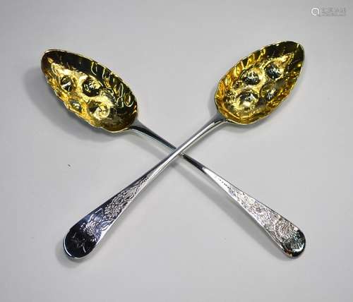 A pair of silver berry spoon