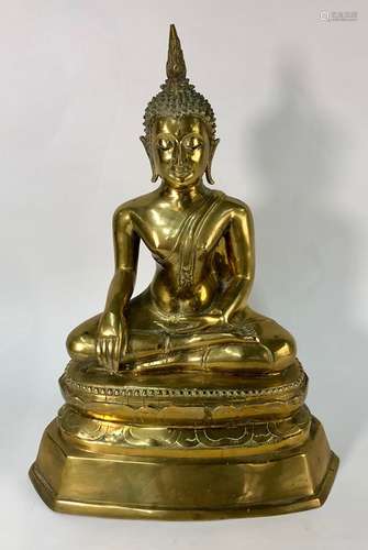 A Thai brass statue of Buddha