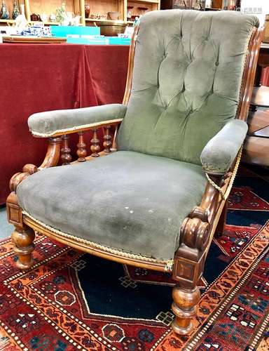 A Victorian button backed mahogany framed library armchair