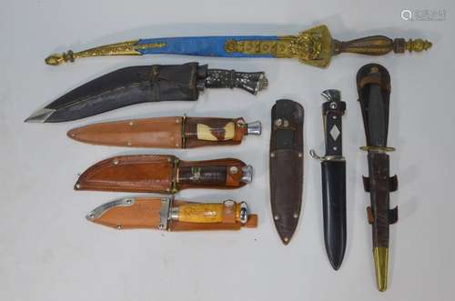 A replica Fairbairn-Sykes-type Commando knife and other knives, kukri and sword