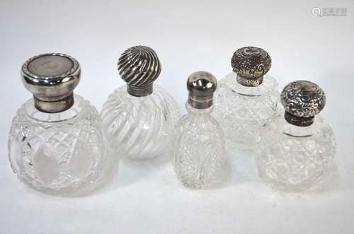 Five scent bottles