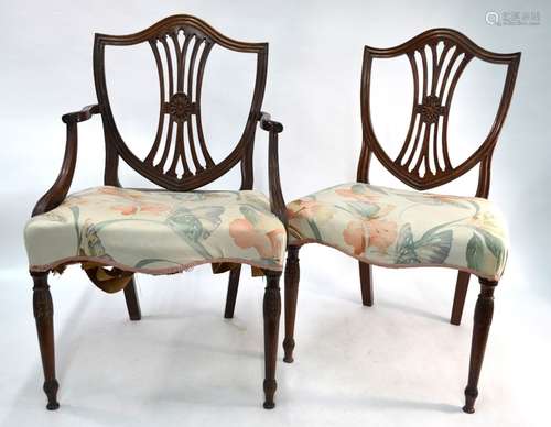 A Hepplewhite shield back mahogany carver chair and two side chairs, late 18th/19th century