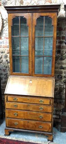 A George III walnut bureau bookcase of diminutive proportions