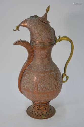 A Persian Qajor pear-shaped copper large coffee pot