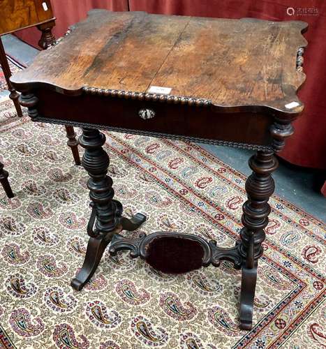 A 19th century continental rosewood work table