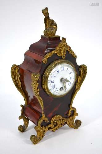 A 19th/20th century gilt metal mounted tortoiseshell mantel clock