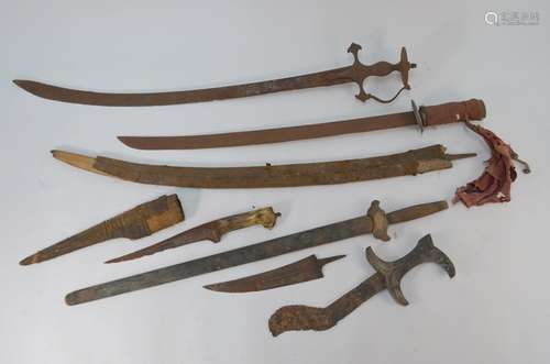 Two 19th century Tulwar swords and other swords