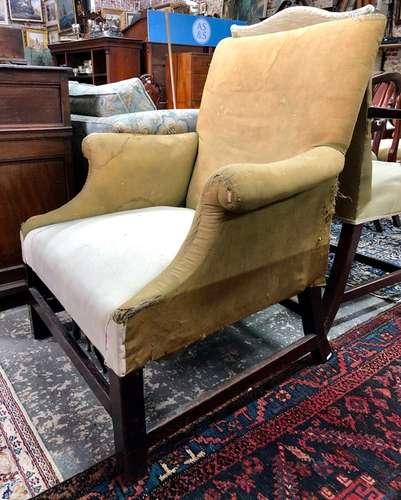 A Georgian mahogany framed upholstered armchair