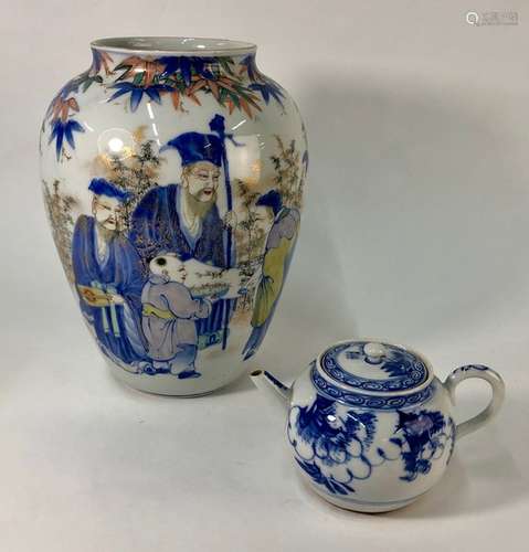 A Chinese polychrome porcelain vase and blue and white teapot