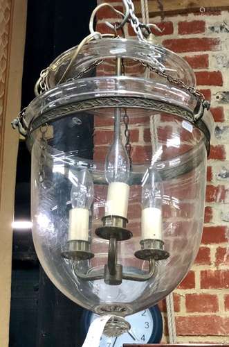 A glass hanging light fitting