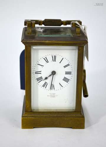 A brass carriage clock 'Examined by Dent'