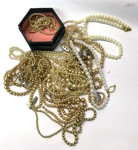 Various cultured and simulated pearl necklaces