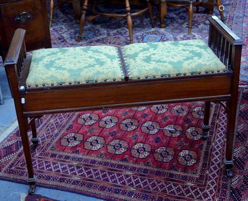 An Edwardian walnut twin seat piano box stool