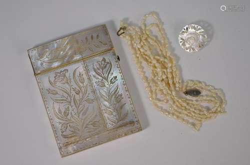 A 19th century mother of pearl visiting card case, necklace and brooch