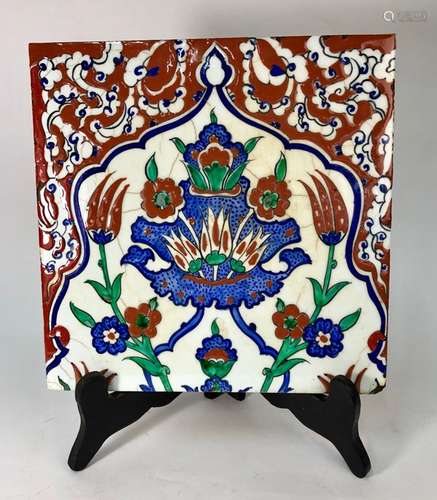 An Isnik glazed pottery tile