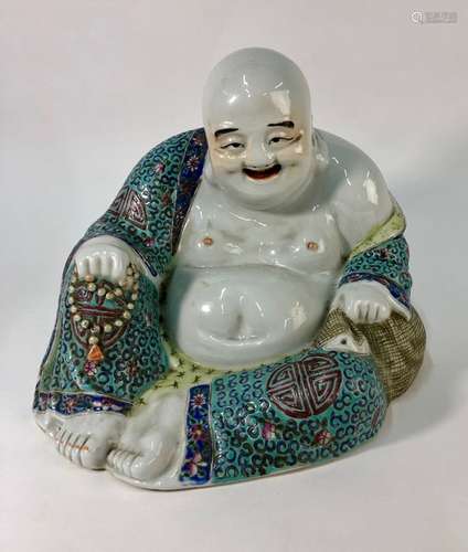 A Chinese Canton famille rose porcelain seated figure of Buddai Hoshang