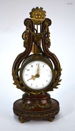 Maple & Co Ltd, Paris, Louis XV revival ormolu and walnut lyre form clock