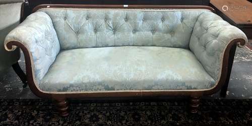 A Victorian mahogany framed button upholstered scroll arm sofa