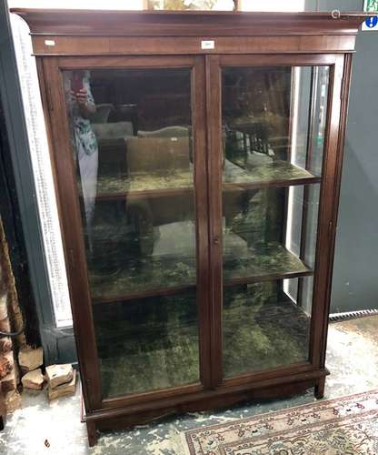 A glazed mahogany display cabinet