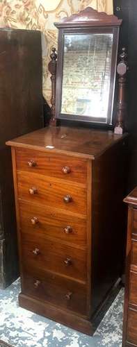 A late Victorian mahogany tall mirror backed chest of five drawers